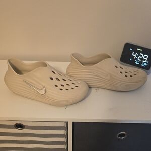 Nike Cream Slip-On Shoes with Silver Logo